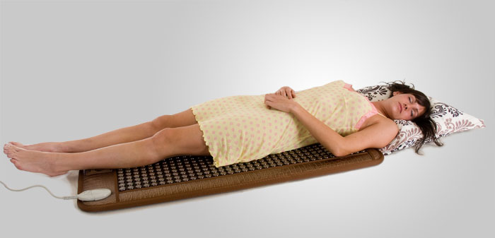 Relieve back pain, lower back, give back massage with infrared heat rays from tourmaline ceramics