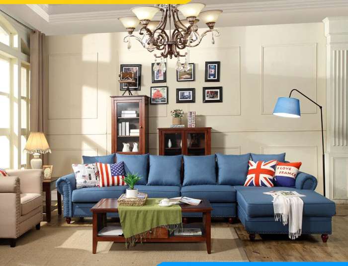 Sofa góc chữ L bọc vải nỉ xanh giúp không gian thêm hiện đại