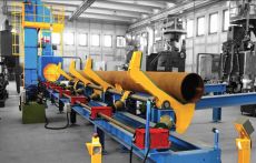 Máy phun bi và làm sạch thép ống