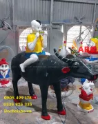 Tượng em bé cưỡi trâu thổi sáo - Tượng vườn cổ tích mầm non