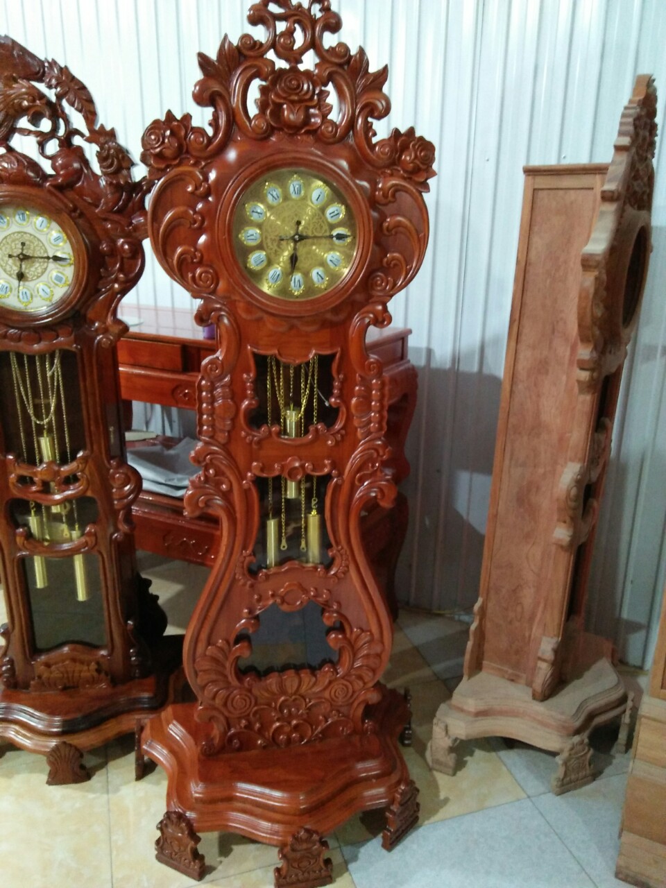 Đồng hồ Cây đàn gỗ hương đá