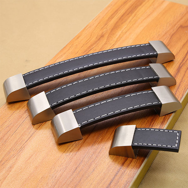 Tay nắm cửa tủ bằng da đầu bắt inox