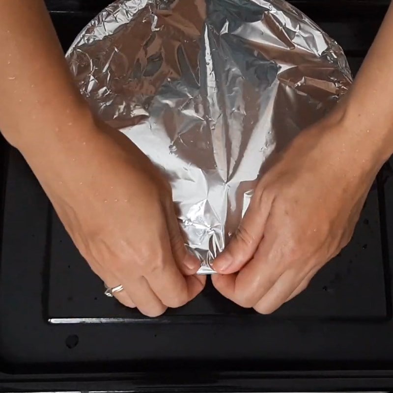 nướng ốc trong giấy bạc