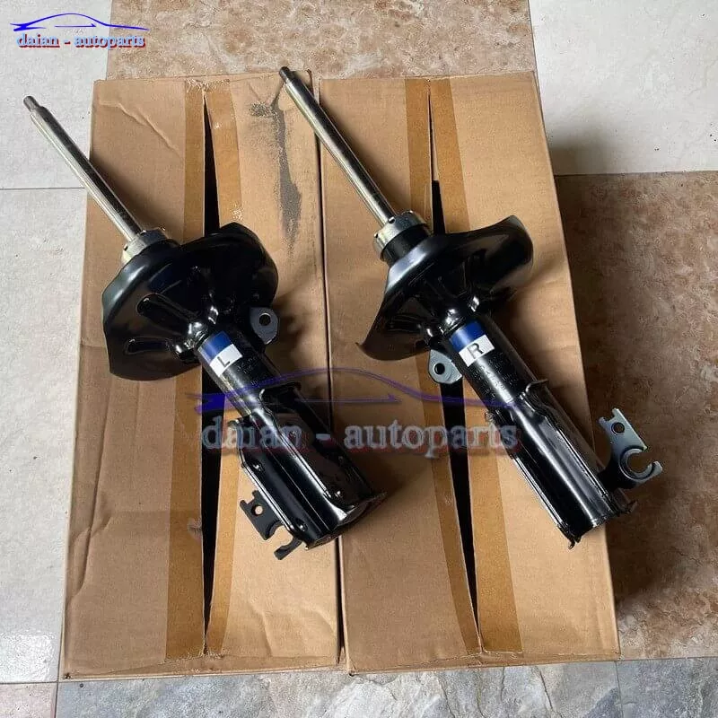 Giảm sóc trước Ford Laser chính hãng B30D34900C B30D34700C