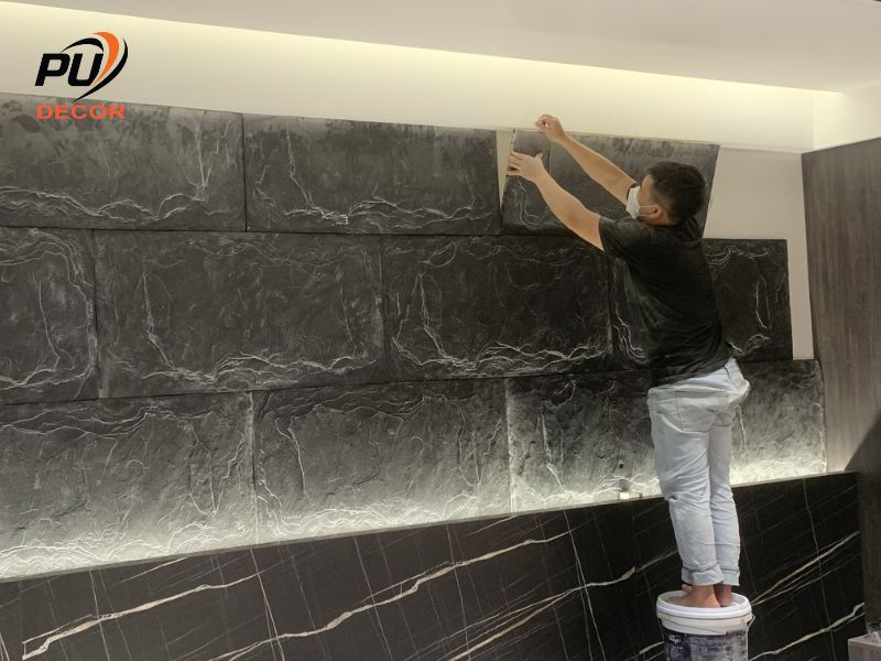 Ứng dụng thực tế của thi công tấm ốp tường giả đá