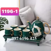Bộ ấm trà sứ xương cao cấp hình cá heo viền vàng  màu xanh cổ vịt