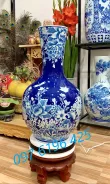 Lọ hoa gốm sứ dáng củ tỏi băng nền xanh vẽ bách hoa