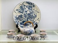 Bộ ấm chén men rạn dáng quả hồng quai mây vẽ hoa sen