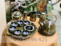Ấm chén Bát Tràng men rêu hoa lòng chén dáng vuốt quai đồng