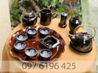 Ấm chén Bát Tràng men nâu hoa lòng chén dáng vuốt quai đồng