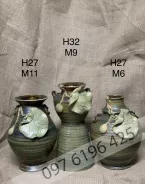 Lọ hoa gốm mộc nền xanh rêu đắp sen nổi