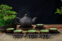 Ấm chén gốm khắc hoa đào men đen lòng xanh