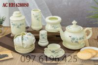 Bộ ấm chén phú quý men kem vẽ hoa đào xanh