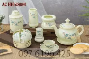 Bộ ấm chén phú quý men kem vẽ hoa đào xanh