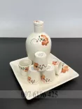 Bộ nậm rượu gốm sứ men trứng vẽ hoa đào