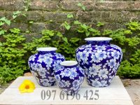 Lọ hoa Bát Tràng dáng vò băng nền xanh vẽ hoa