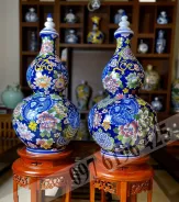 Hồ lô sứ tài lộc băng nền xanh vẽ bách hoa
