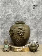 Bình gốm mộc dáng tròn đắp sen