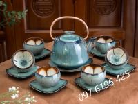 Ấm chén men hỏa biến xanh quai đồng lòng hoa