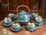 Ấm chén men hỏa biến xanh quai đồng lòng hoa
