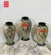 Lọ hoa dáng đùi dế đắp hoa
