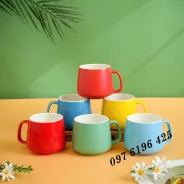 Ly sứ men màu miệng cúp quai vuông