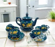 Bộ trà kẻ vàng phú quý quý men xanh hoa mai