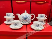 Bộ trà Bát Tràng kẻ vàng vẽ chim đào vàng kim