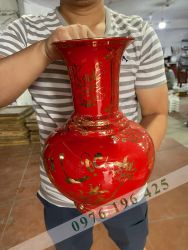 Lọ quà tặng màu đỏ vẽ vàng dáng củ tỏi