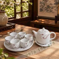 Bộ trà Bát Tràng quai sứ men tấm vẽ sen trắng