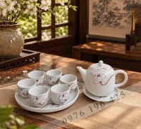 Bộ trà Bát Tràng quai sứ men tấm vẽ sen trắng