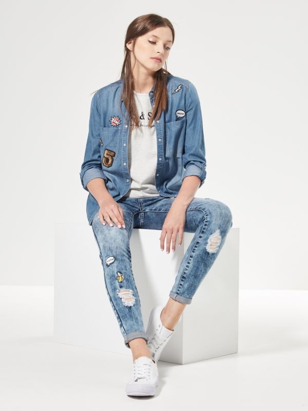 Quần skinny jeans with stickers