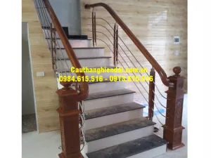 Cầu Thang Suốt Inox Tay Vịn Gỗ
