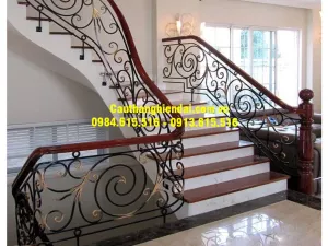 Cầu thang sắt nghệ thuật -tay vịn gỗ lim nam phi