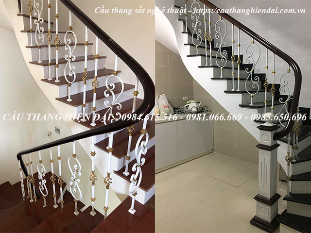Cầu thang sắt mỹ thuật cổ điển sang trọng, kết cấu bởi các họa tiết sắt trang trí, tay vịn gỗ lim nam phí