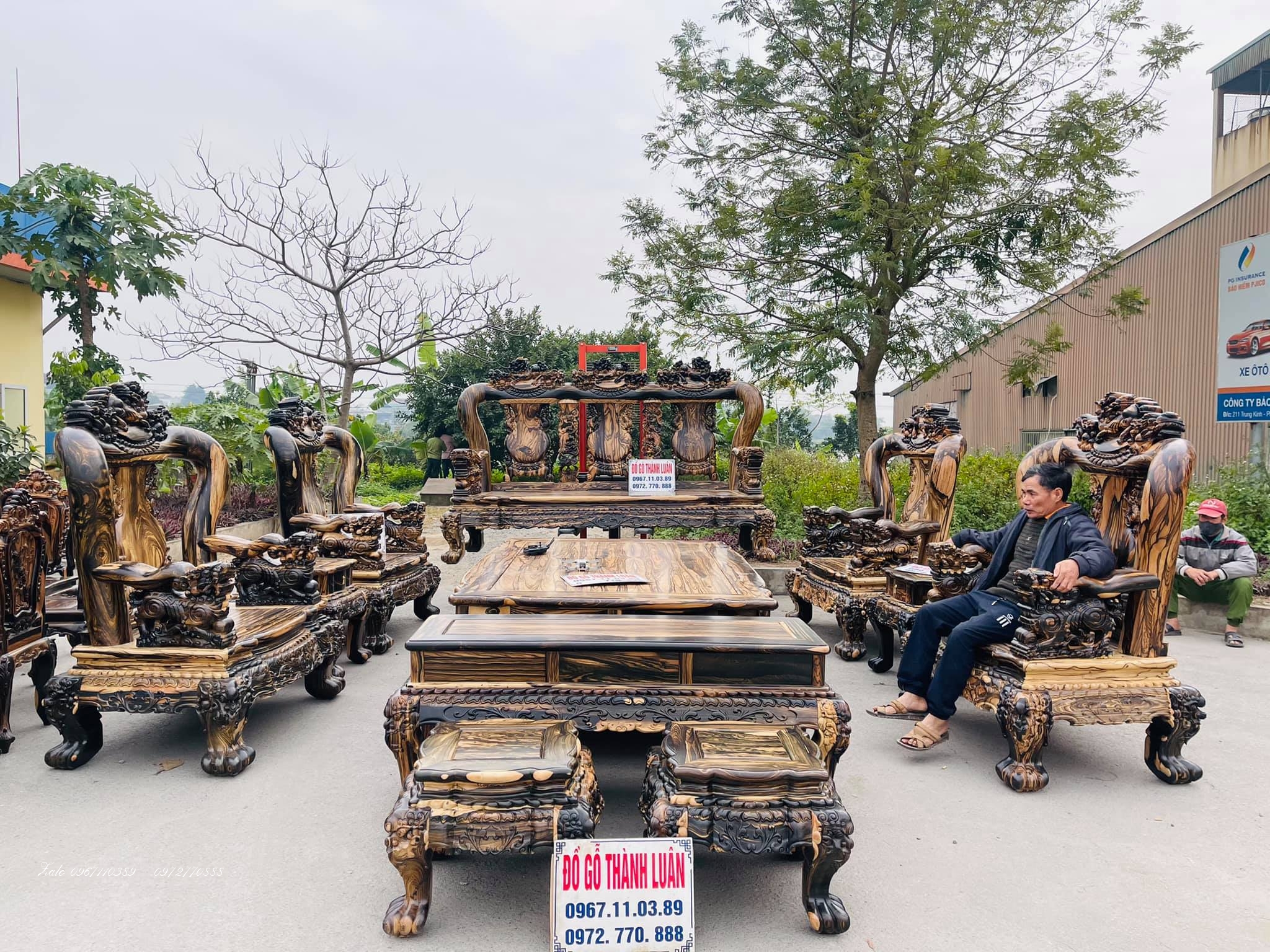 Bộ Bàn Ghế Minh Quốc Nghê Gỗ Mun