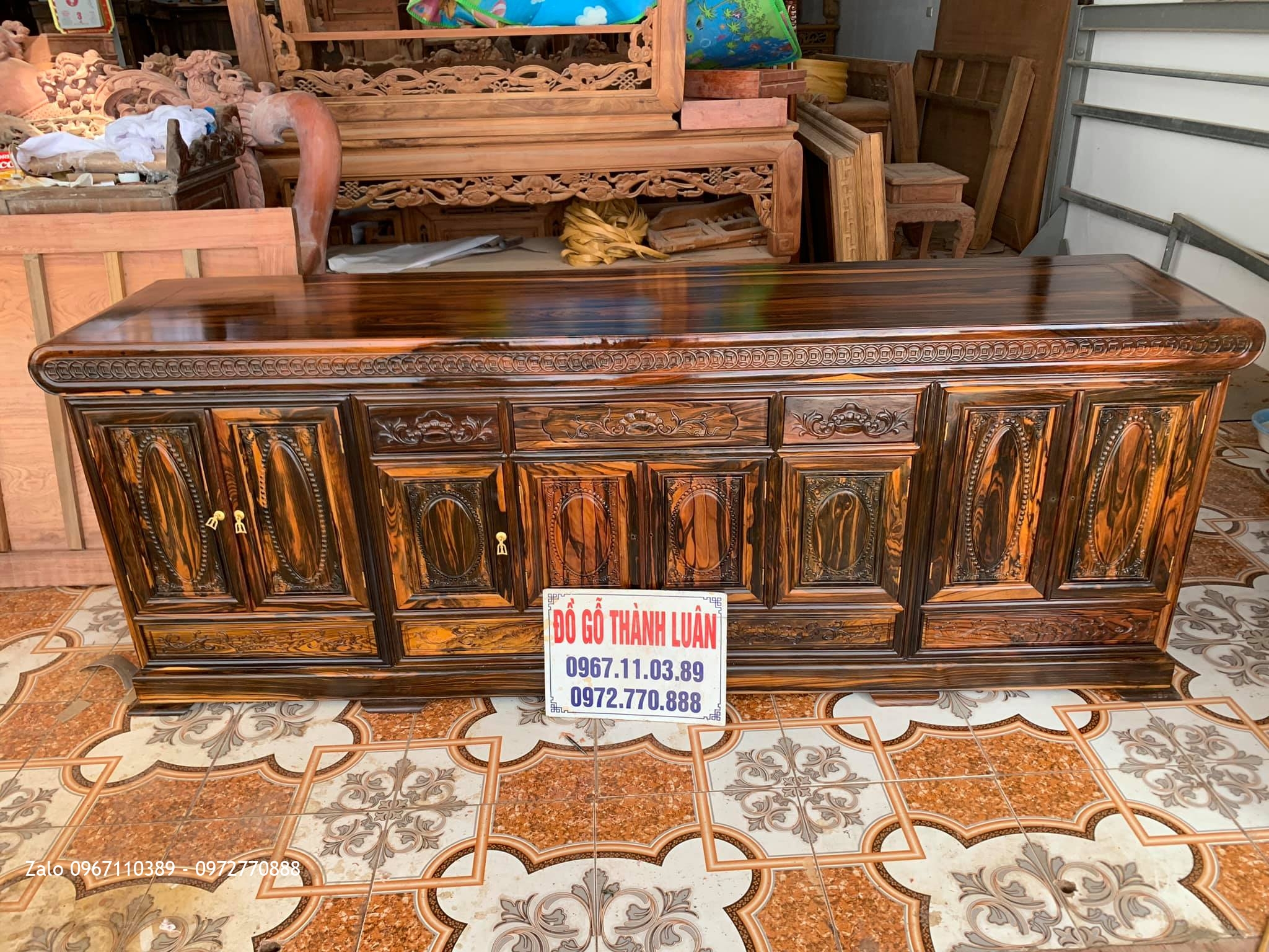 Kệ Tivi Gỗ Mun Víp Mẫu Đồng Tiền Mặt Phẳng Bán Về Nghệ An.