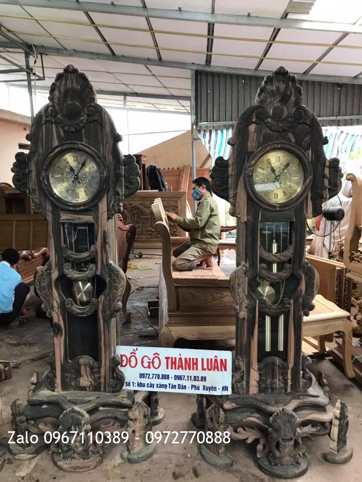 2 Đồng Hồ Gỗ Mun Chân Hoa Lan Tây Víp