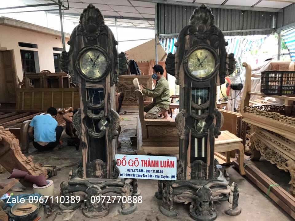 2 Đồng Hồ Gỗ Mun Chân Hoa Lan Tây Víp