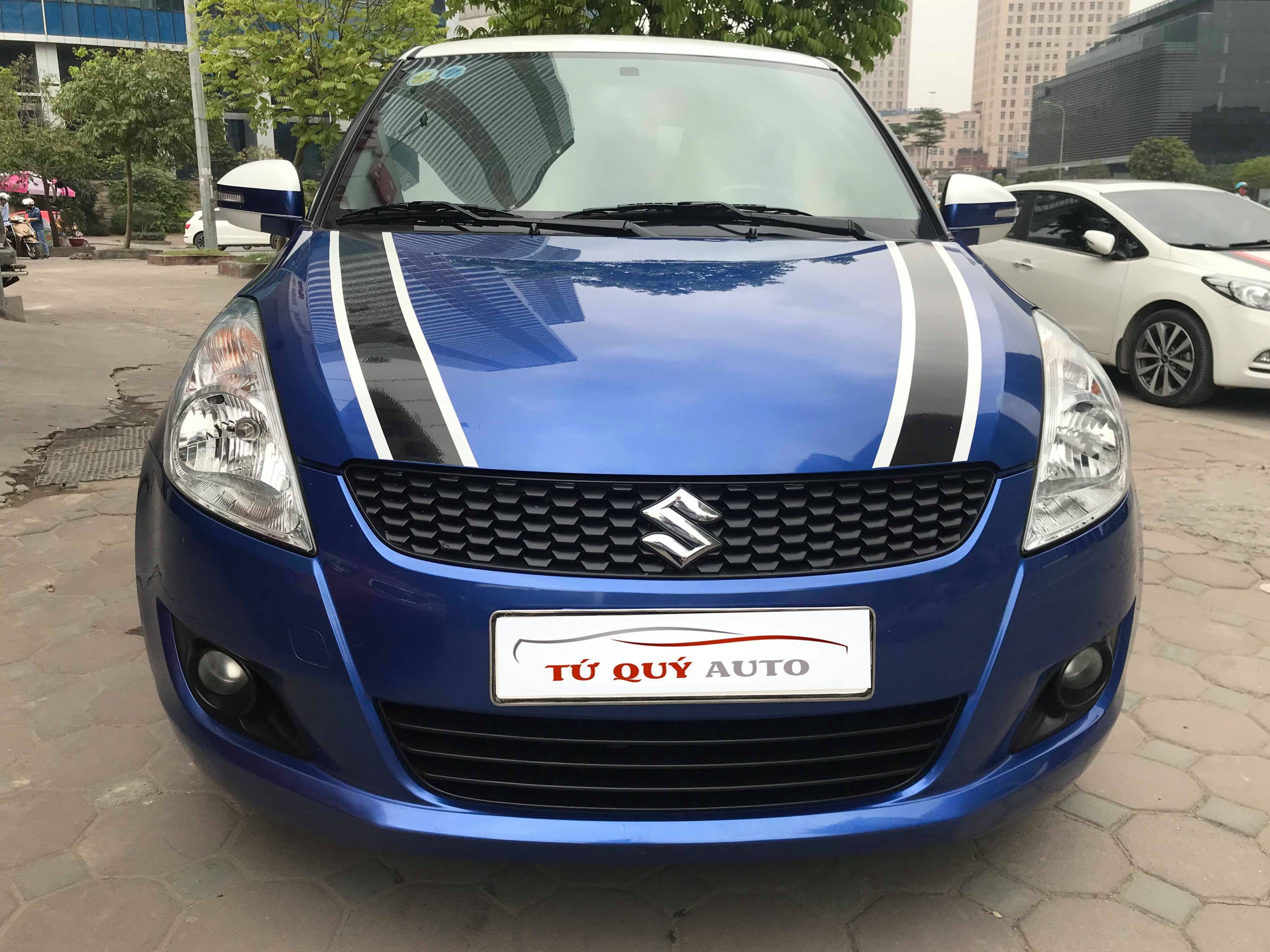 Xe Suzuki Swift 1.4AT 2015 - Xanh/Trắng