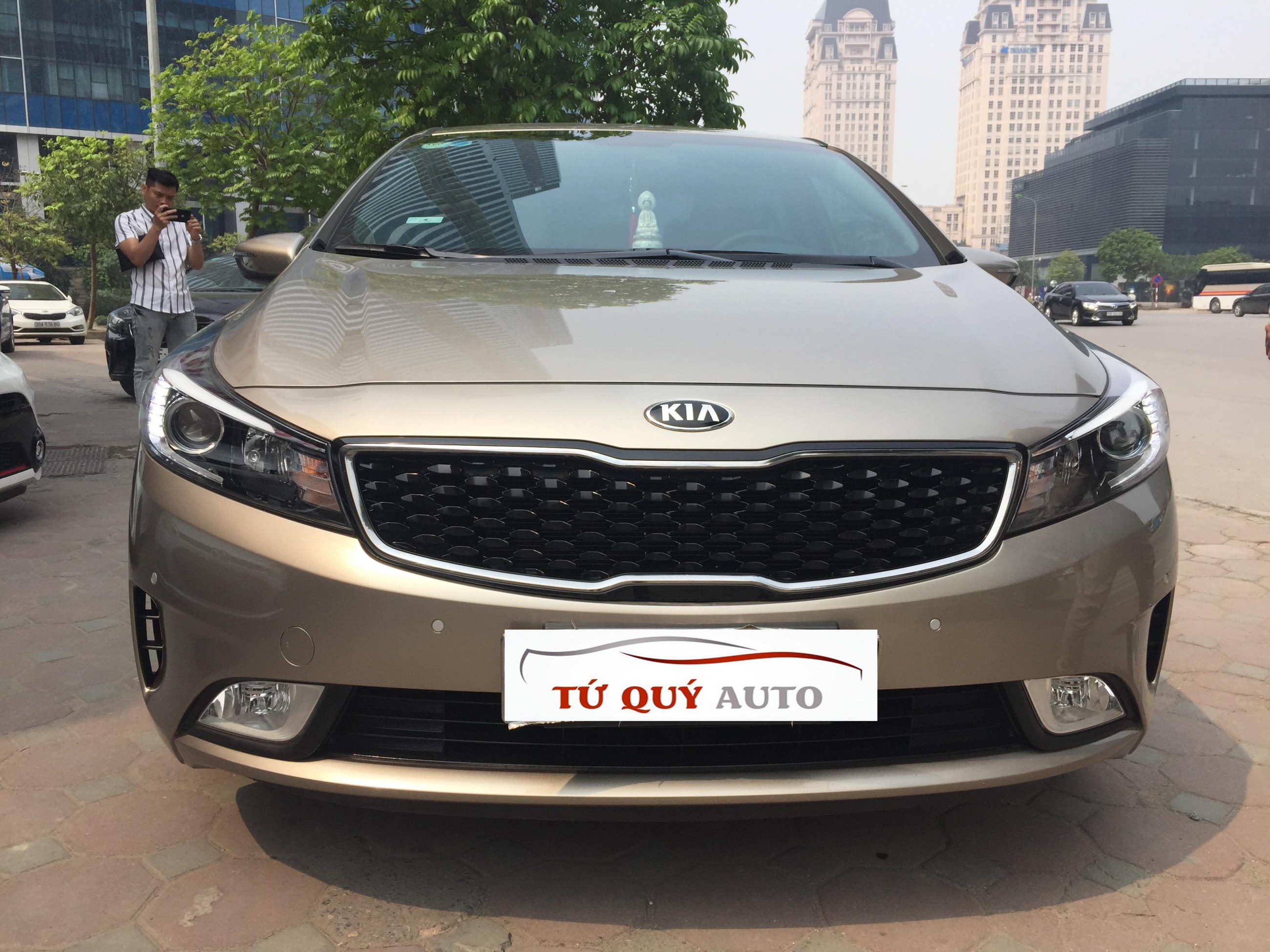 Xe Kia Cerato 1.6AT 2016 - Vàng cát