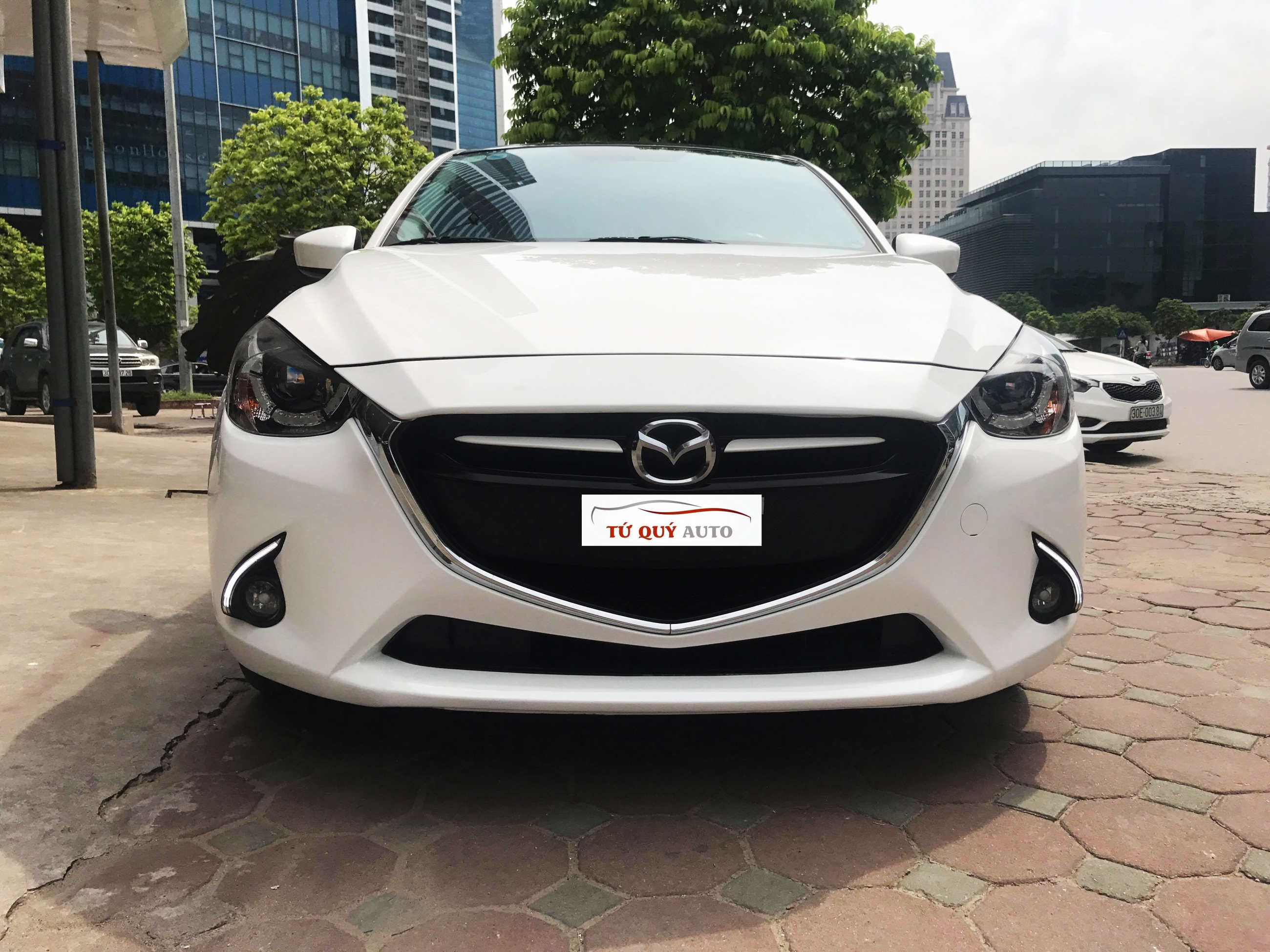 Xe Mazda 2 Hatchback 1.5AT 2016 - Trắng