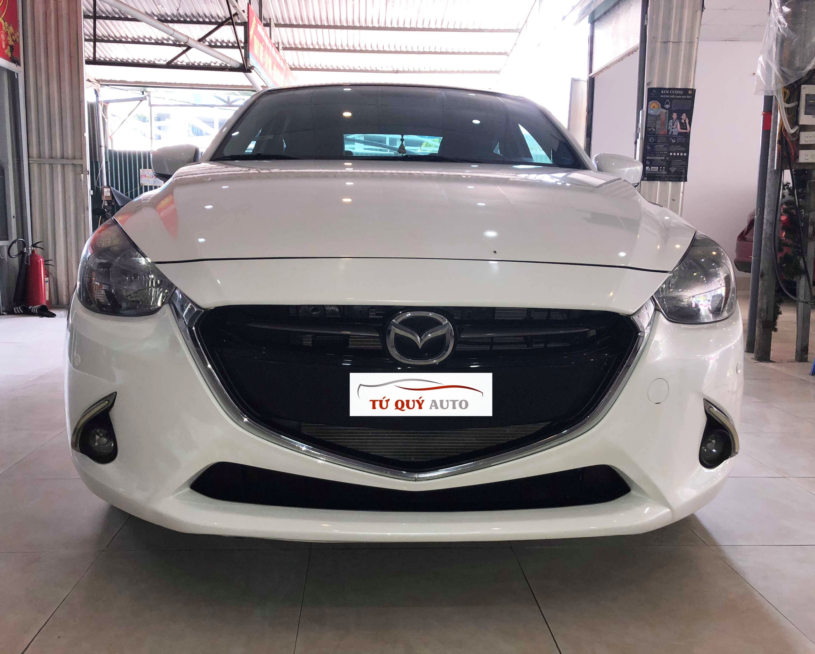 Xe Mazda 2 Sedan 1.5AT 2015 - Trắng