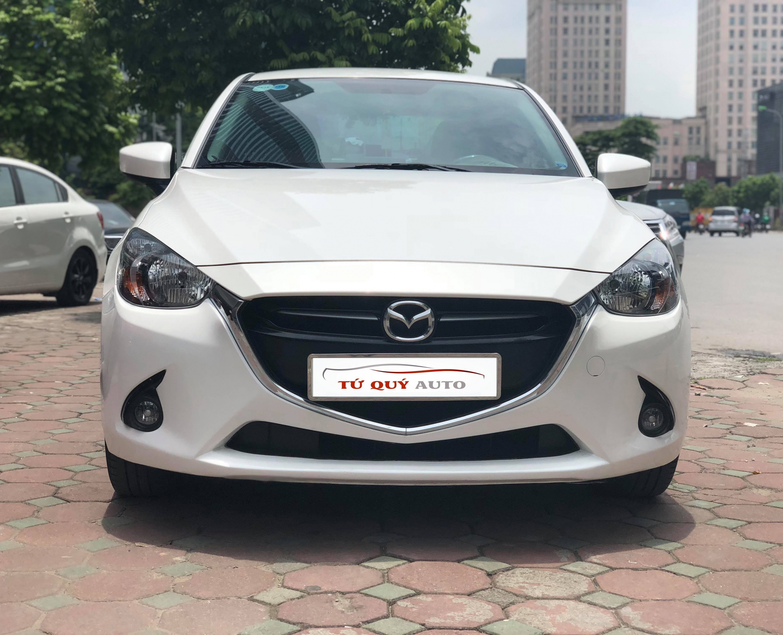 Xe Mazda 2 Sedan 1.5 AT 2016 - Trắng