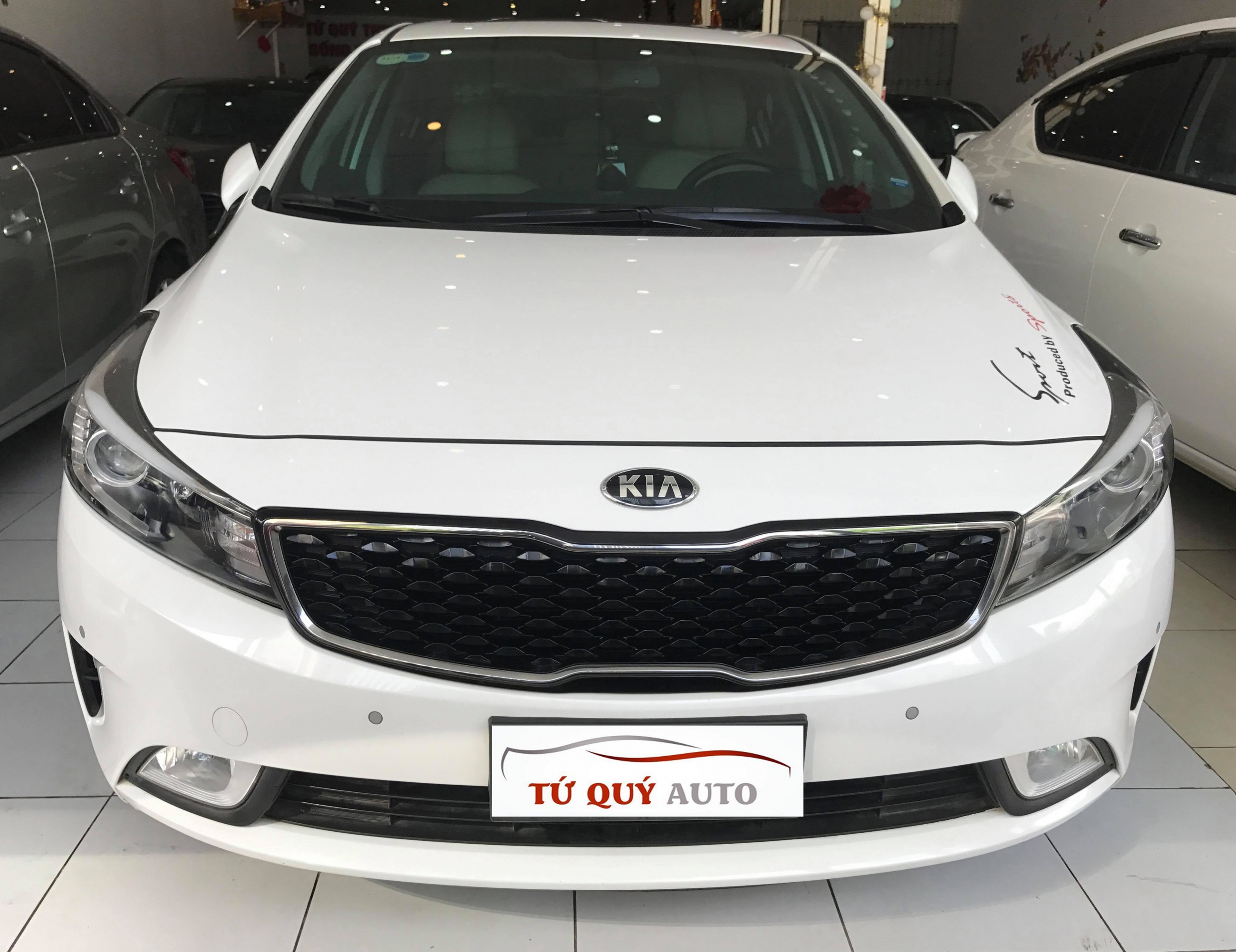 Xe Kia Cerato 2.0AT 2016 - Trắng