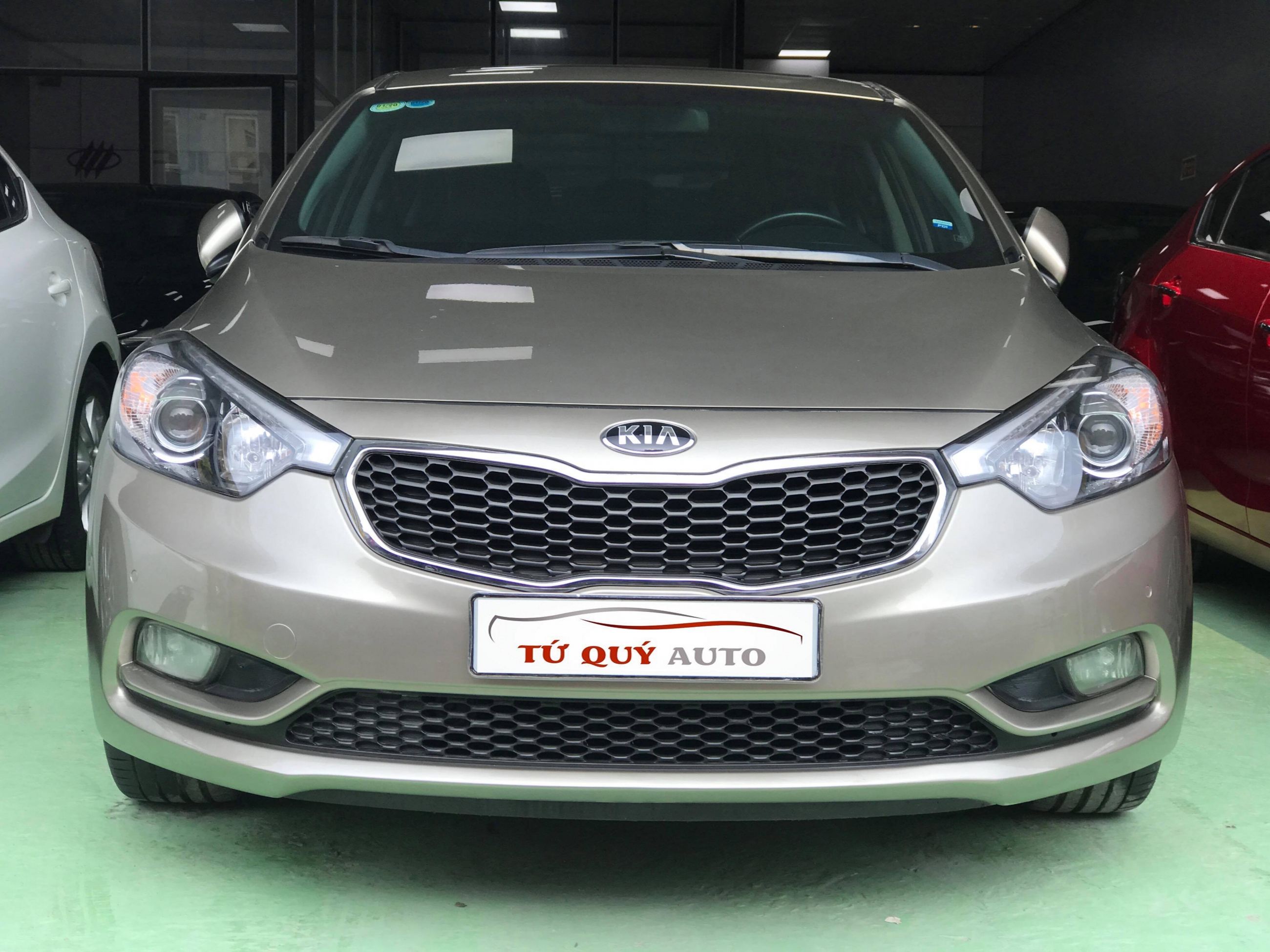 Xe Kia K3 1.6 AT 2014 - Vàng cát