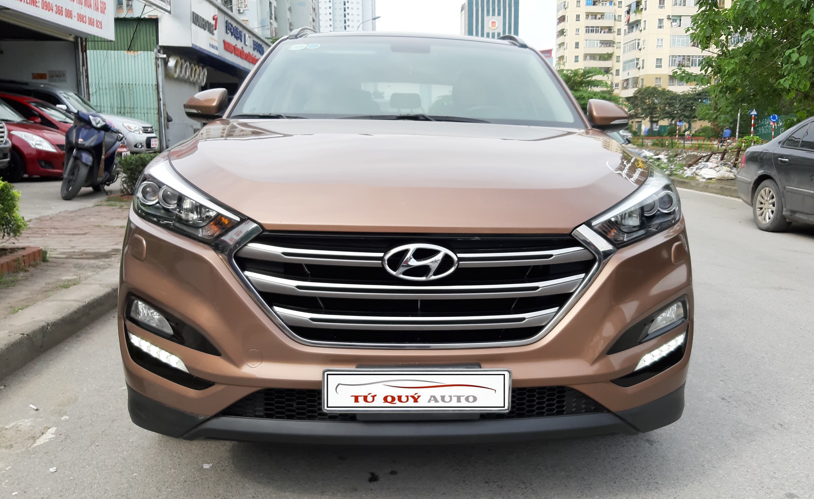 Xe Hyundai Tucson 2.0AT 2015 - Nâu