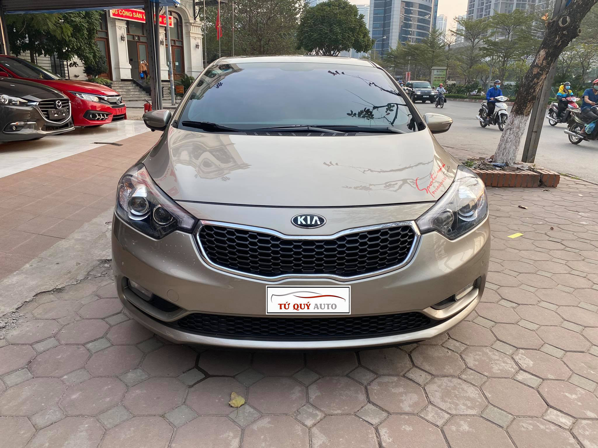 Xe Kia K3 2.0AT 2015 - Vàng Cát