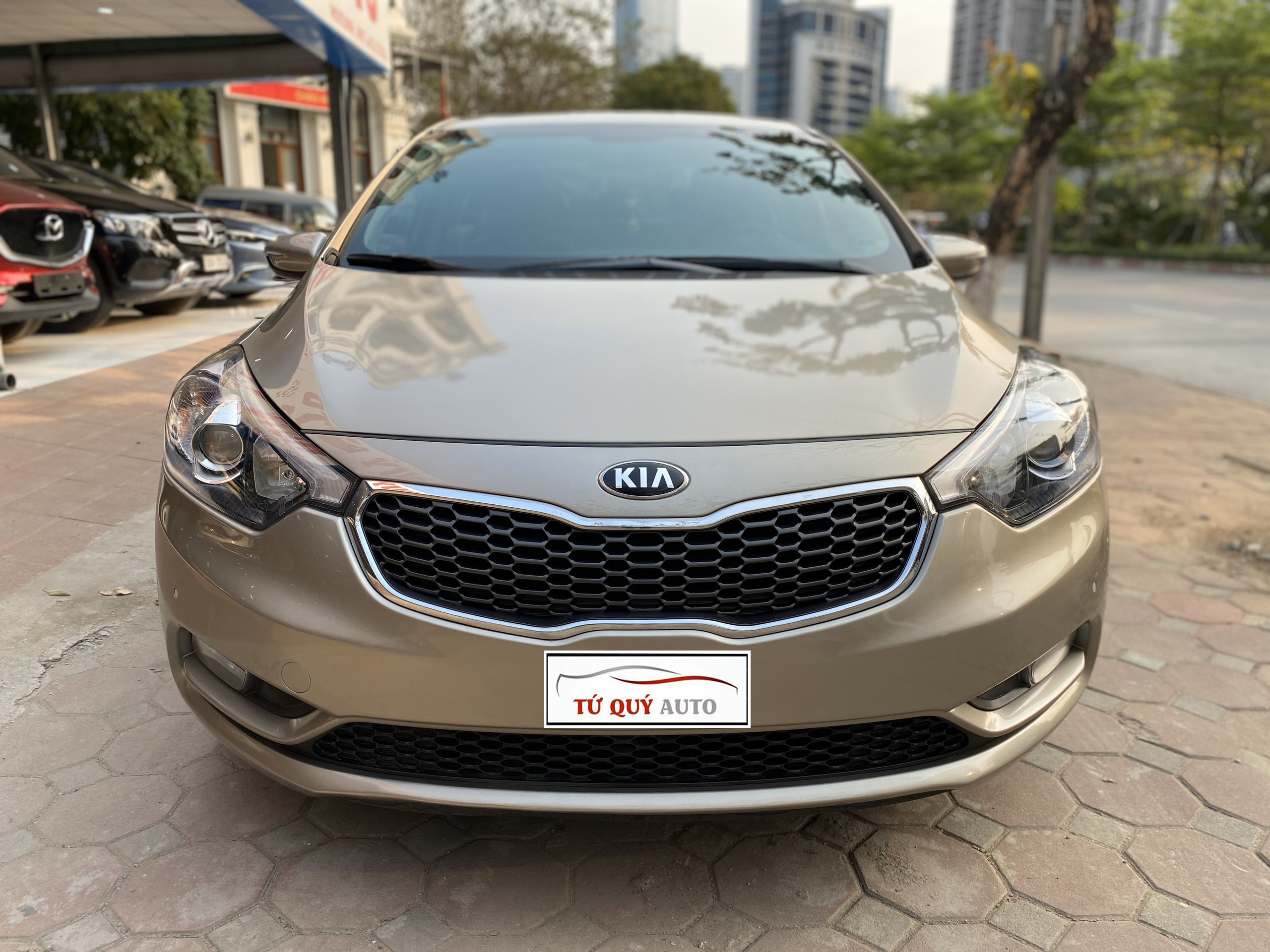 Xe Kia K3 1.6AT 2015 - Vàng Cát