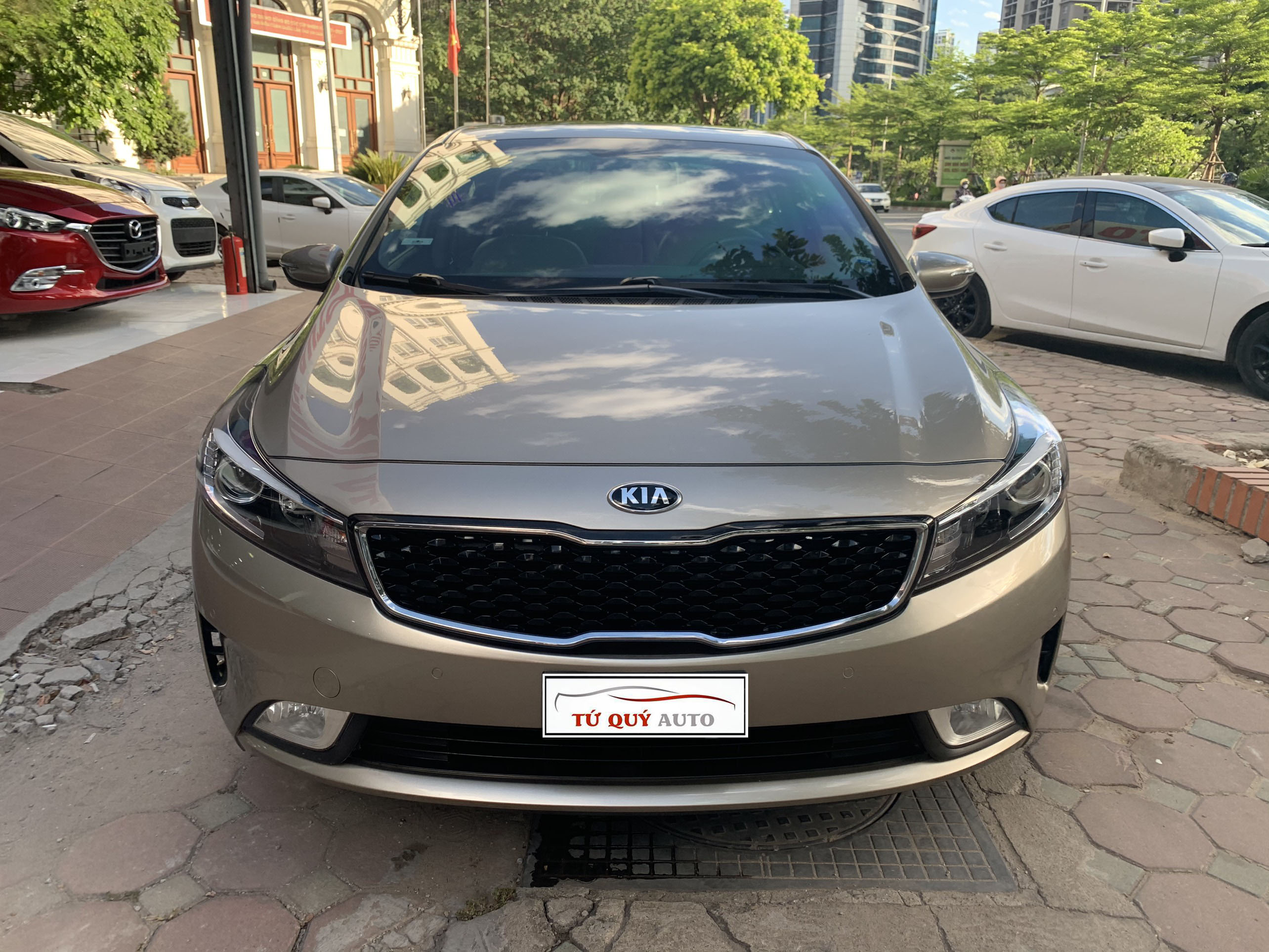 Xe Kia Cerato 2.0AT 2017 - Vàng Cát